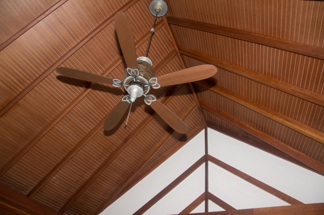 Fan installed in the ceiling of the beach villa - above the bed